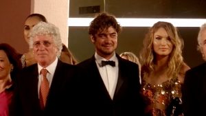 Riccardo Scamarcio insieme a Ninetto Davoli alla 71ª Mostra internazionale d'arte cinematografica di Venezia (2014) - wikipedia